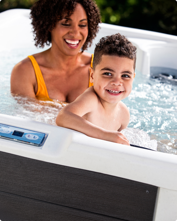 woman-and-kid-sitting-in-a-spa woman-and-kid-sitting-in-a-spa